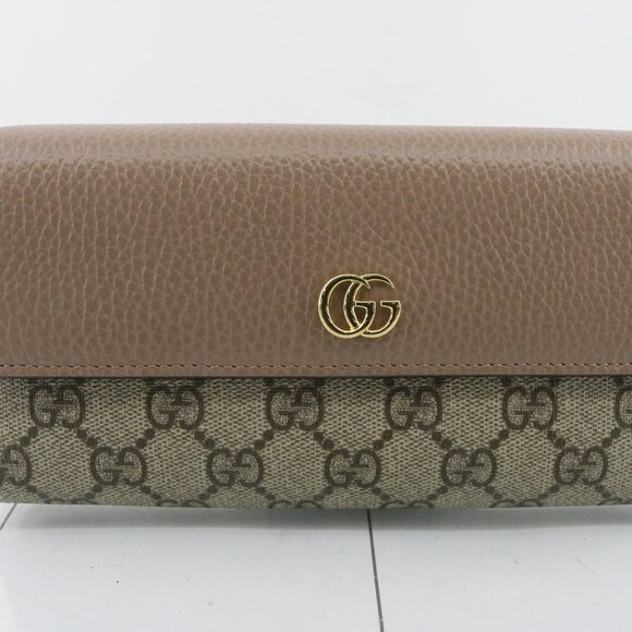Gucci Handbags - Gucci Brown and Tan Wallet